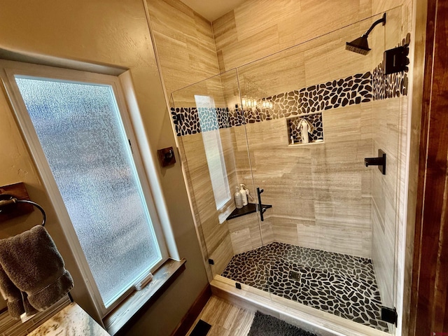 full bathroom with a shower stall
