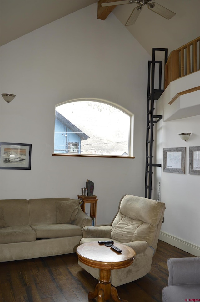 1125 Cement St, Silverton, CO 81433 - living area with a ceiling fan, wood finished floors, beamed ceiling, high vaulted ceiling, and baseboards