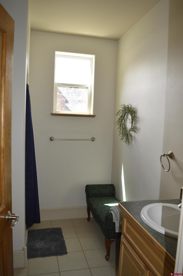 1125 Cement St, Silverton, CO 81433 - full bathroom featuring tile patterned floors, vanity, and baseboards