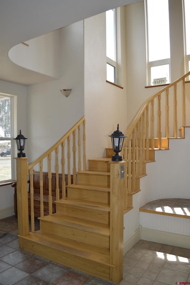 1125 Cement St, Silverton, CO 81433 - stairs featuring baseboards