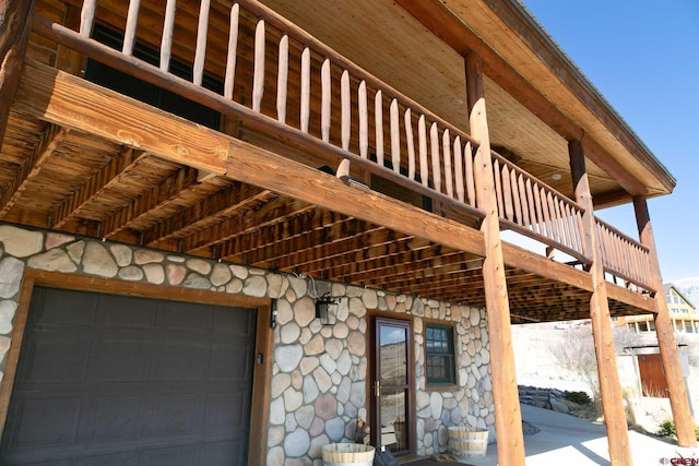 exterior space with stone siding