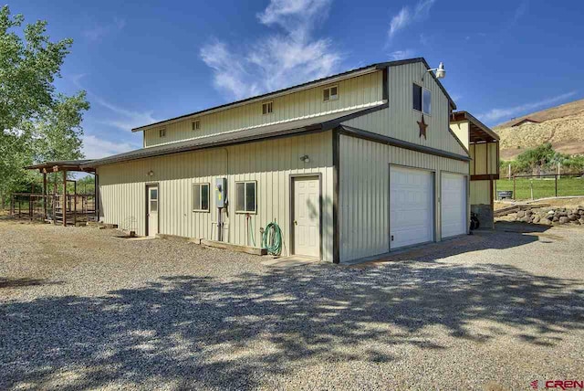 3575 E Rd, Palisade, CO 81526 - exterior space with an outbuilding and a garage