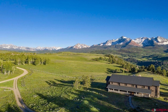 view of mountain feature with a rural view