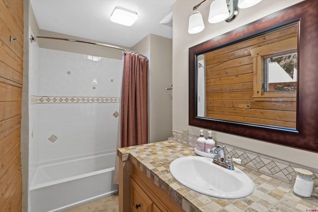 bathroom featuring shower / bath combination with curtain and vanity