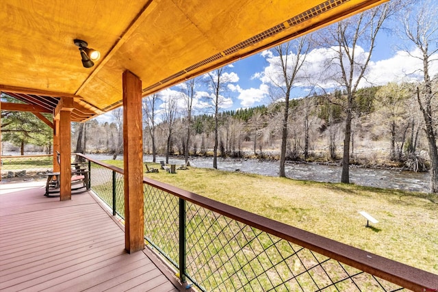 deck featuring a yard