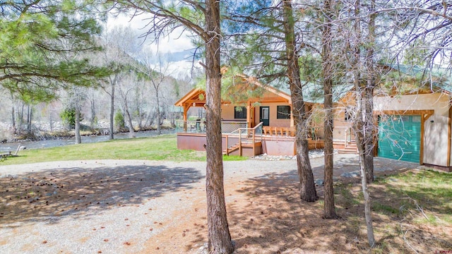 view of yard with covered porch