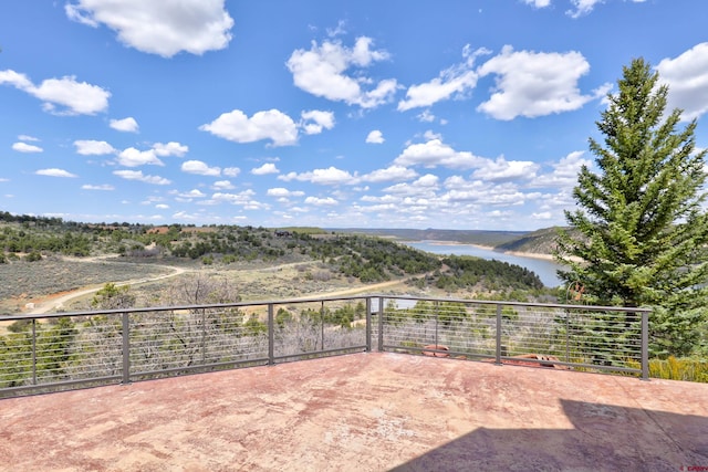 view of patio / terrace with a water view