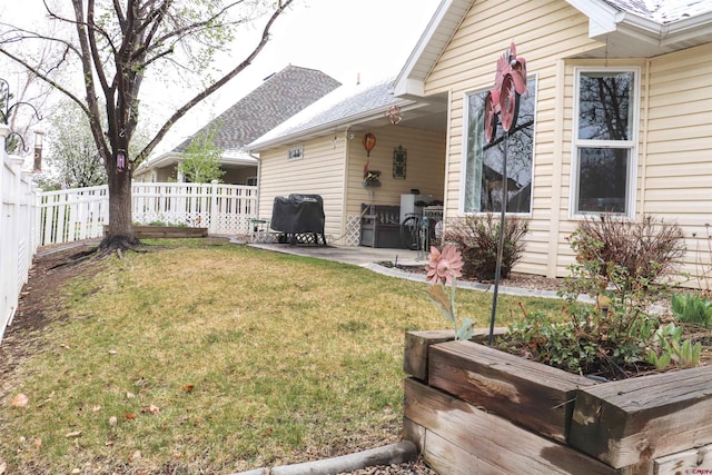 view of yard featuring a patio area and fence