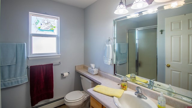 full bathroom with a shower stall, a baseboard heating unit, toilet, and vanity