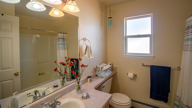 bathroom featuring toilet, a shower with shower curtain, and a baseboard radiator