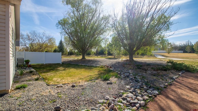 view of yard with fence