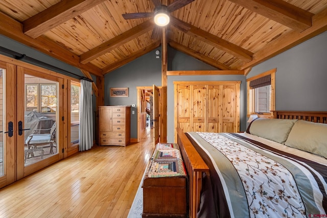 bedroom featuring light wood finished floors, wooden ceiling, a closet, vaulted ceiling with beams, and access to exterior
