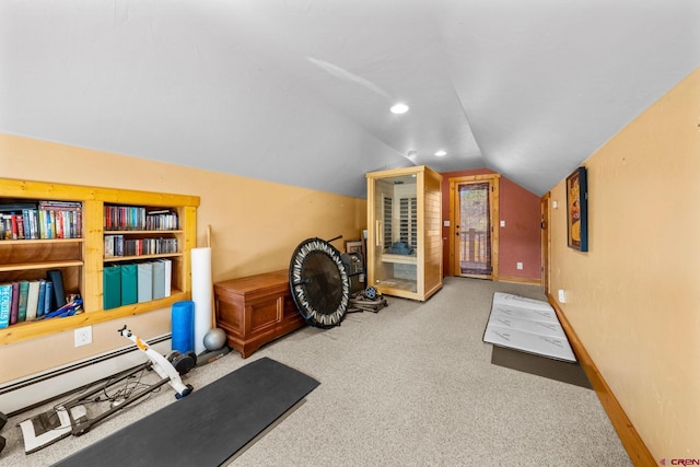 workout area with carpet, a baseboard heating unit, vaulted ceiling, and baseboards