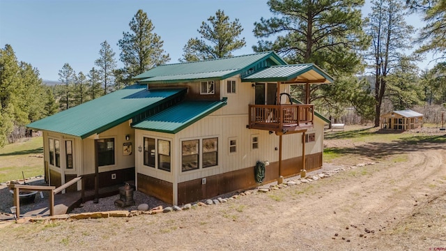 85 Mclain Ct, Pagosa Springs, CO 81147 - rear view of property with metal roof