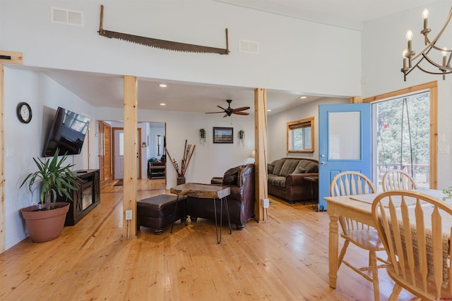 85 Mclain Ct, Pagosa Springs, CO 81147 - living room with visible vents, ceiling fan with notable chandelier, and light wood-type flooring