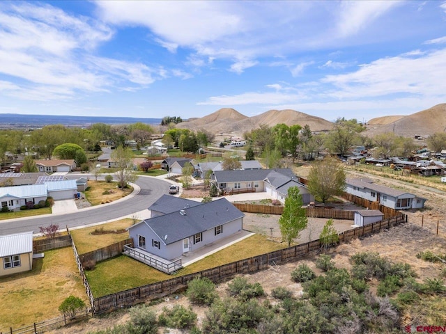 drone / aerial view with a mountain view and a residential view