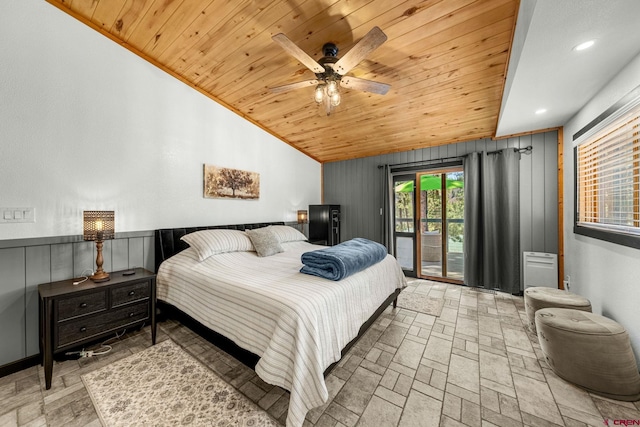bedroom with ceiling fan, wooden ceiling, lofted ceiling, wooden walls, and access to outside