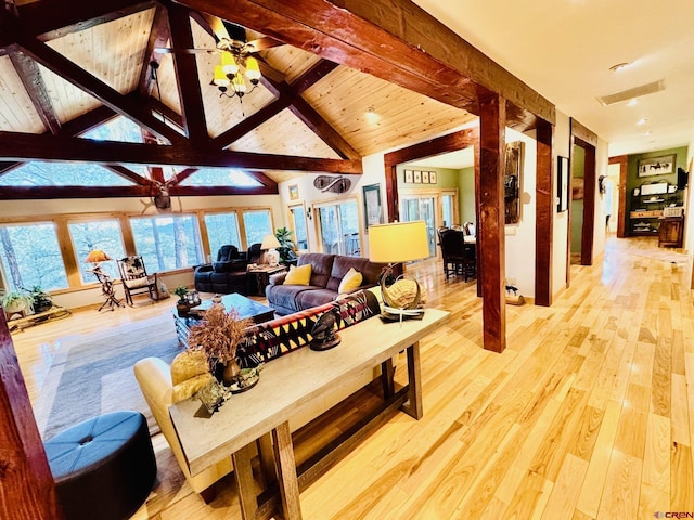 living area with recessed lighting, ceiling fan, lofted ceiling with beams, and light wood-type flooring