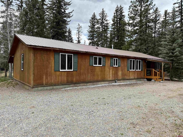 exterior space featuring metal roof