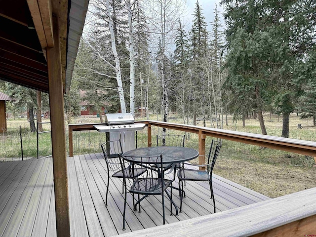 deck featuring outdoor dining space