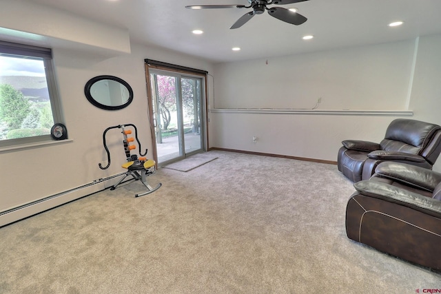 interior space with carpet flooring, a ceiling fan, recessed lighting, and plenty of natural light