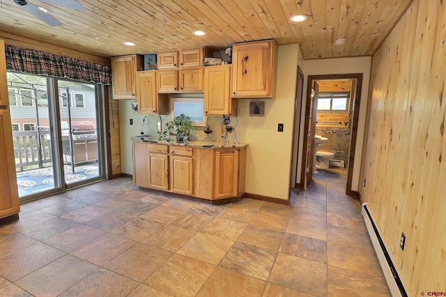 kitchen with light brown cabinetry, wood ceiling, a baseboard heating unit, and recessed lighting