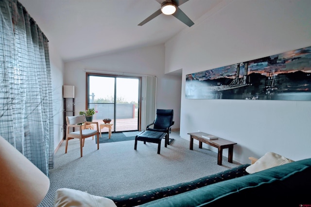 carpeted living room with ceiling fan and lofted ceiling