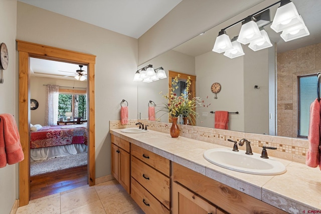 300 Copper Rim Trl, Durango, CO 81301 - ensuite bathroom featuring double vanity, a ceiling fan, a sink, and ensuite bathroom
