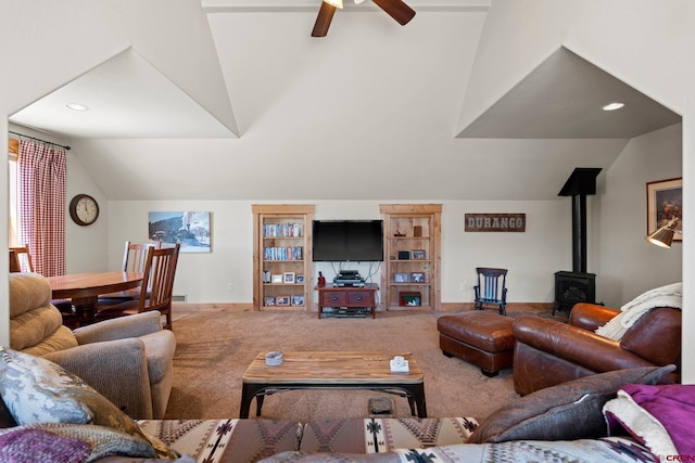 300 Copper Rim Trl, Durango, CO 81301 - living area with a ceiling fan, a wood stove, vaulted ceiling, carpet, and recessed lighting