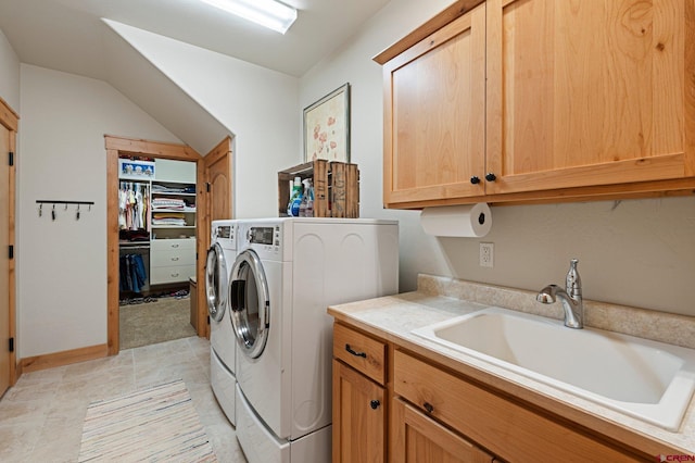 300 Copper Rim Trl, Durango, CO 81301 - clothes washing area with a sink, washing machine and dryer, and cabinet space