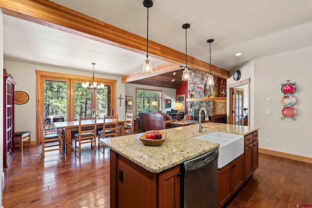300 Copper Rim Trl, Durango, CO 81301 - kitchen with a sink, dishwasher, a chandelier, baseboards, and dark wood-style floors