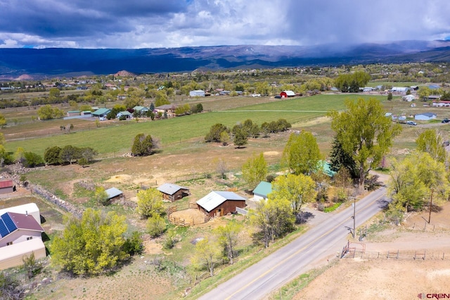 aerial view featuring a mountain view and a rural view