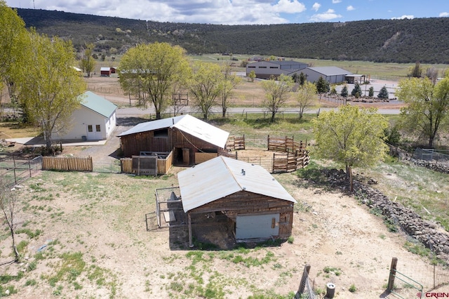 aerial view featuring a mountain view and a rural view