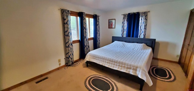 108 N 15th St, Dolores, CO 81323 - bedroom featuring carpet floors, baseboards, and visible vents