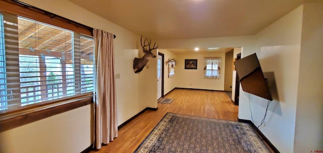 108 N 15th St, Dolores, CO 81323 - corridor featuring baseboards, light wood-style flooring, and visible vents