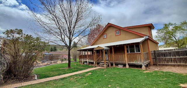108 N 15th St, Dolores, CO 81323 - back of property with a yard and a fenced backyard