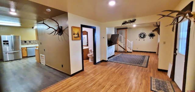 108 N 15th St, Dolores, CO 81323 - interior space with stairway, baseboards, visible vents, and light wood finished floors