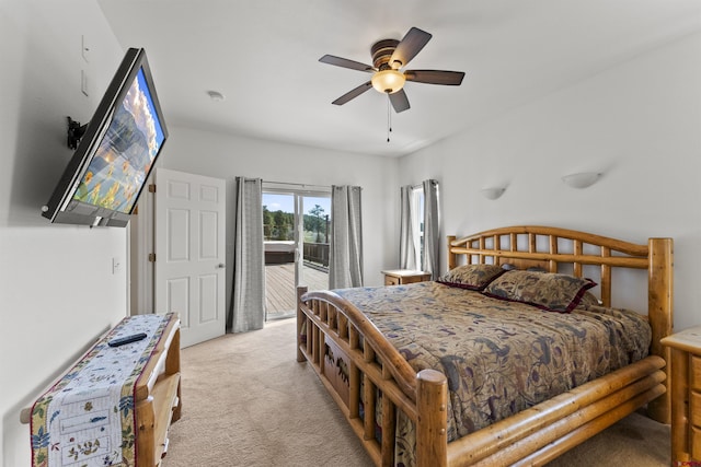 bedroom with access to outside, light carpet, and ceiling fan