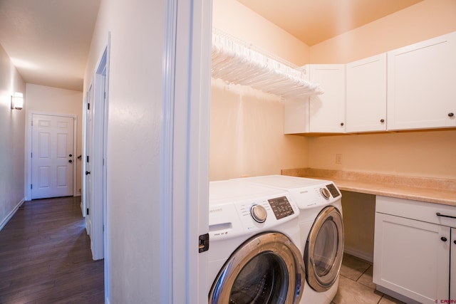 1010 N 11th St, Gunnison, CO 81230 - laundry room featuring washing machine and dryer, light wood finished floors, and cabinet space