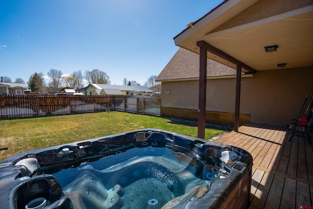 1010 N 11th St, Gunnison, CO 81230 - wooden terrace with a fenced backyard, a yard, and hot tub deck surround