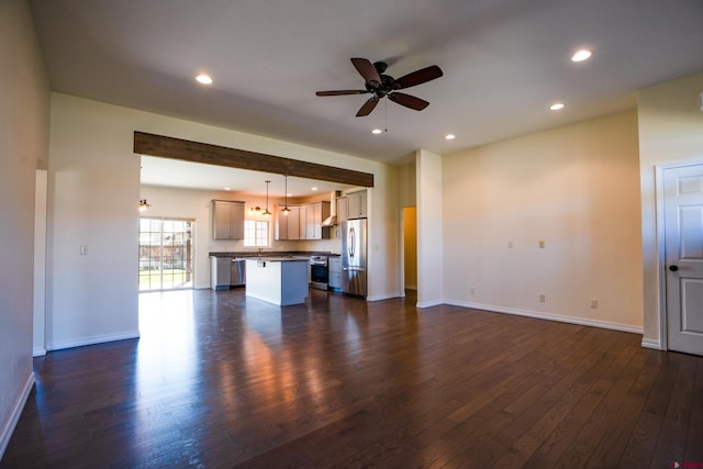 1010 N 11th St, Gunnison, CO 81230 - unfurnished living room featuring dark wood-style flooring, ceiling fan, and recessed lighting
