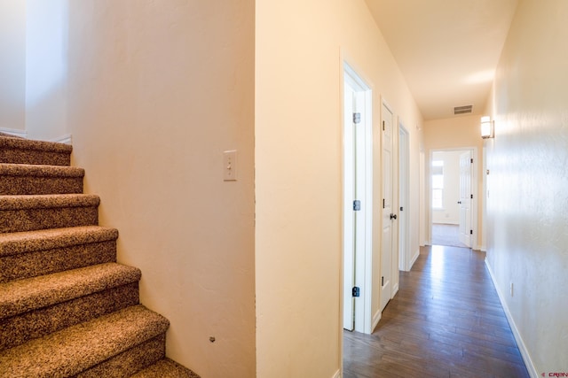 1010 N 11th St, Gunnison, CO 81230 - interior space featuring baseboards, stairs, wood finished floors, and visible vents