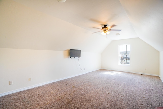 1010 N 11th St, Gunnison, CO 81230 - additional living space with vaulted ceiling, baseboards, a ceiling fan, and carpet flooring
