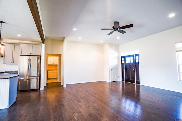 1010 N 11th St, Gunnison, CO 81230 - unfurnished living room with recessed lighting, ceiling fan, and dark wood-style flooring