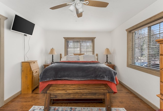 746 W Vallecito Crk, Bayfield, CO 81122 - bedroom featuring baseboards, ceiling fan, and wood finished floors