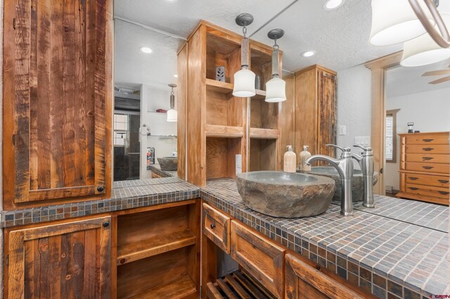 746 W Vallecito Crk, Bayfield, CO 81122 - bathroom with recessed lighting, a textured ceiling, and vanity