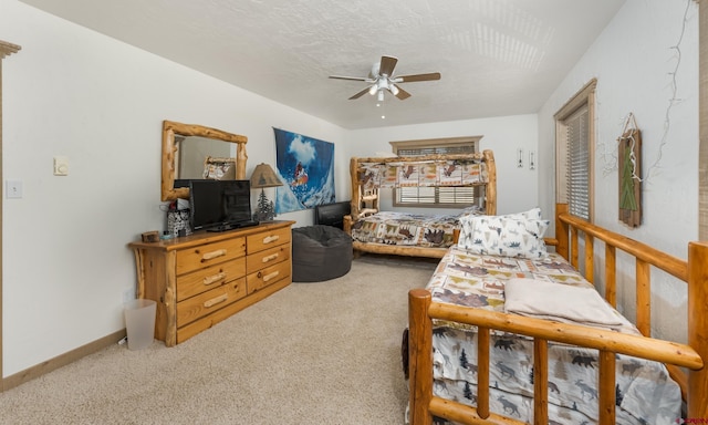 746 W Vallecito Crk, Bayfield, CO 81122 - bedroom featuring baseboards, ceiling fan, and carpet