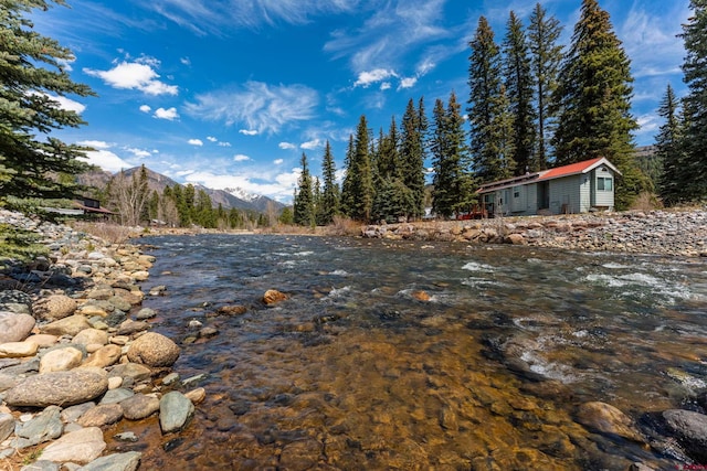 746 W Vallecito Crk, Bayfield, CO 81122 - view of yard featuring a water and mountain view