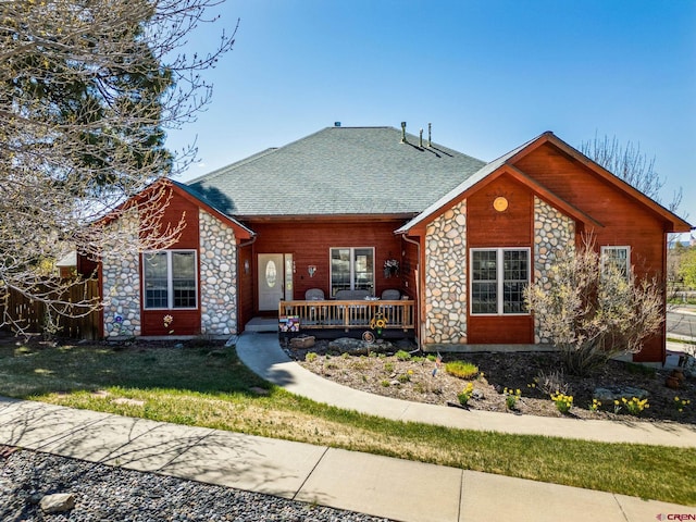 500 Dove Ranch Rd, Bayfield, CO 81122 - rear view of property with a lawn, a shingled roof, and stone siding