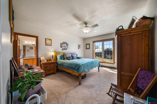 500 Dove Ranch Rd, Bayfield, CO 81122 - bedroom with light colored carpet, a ceiling fan, and a textured ceiling